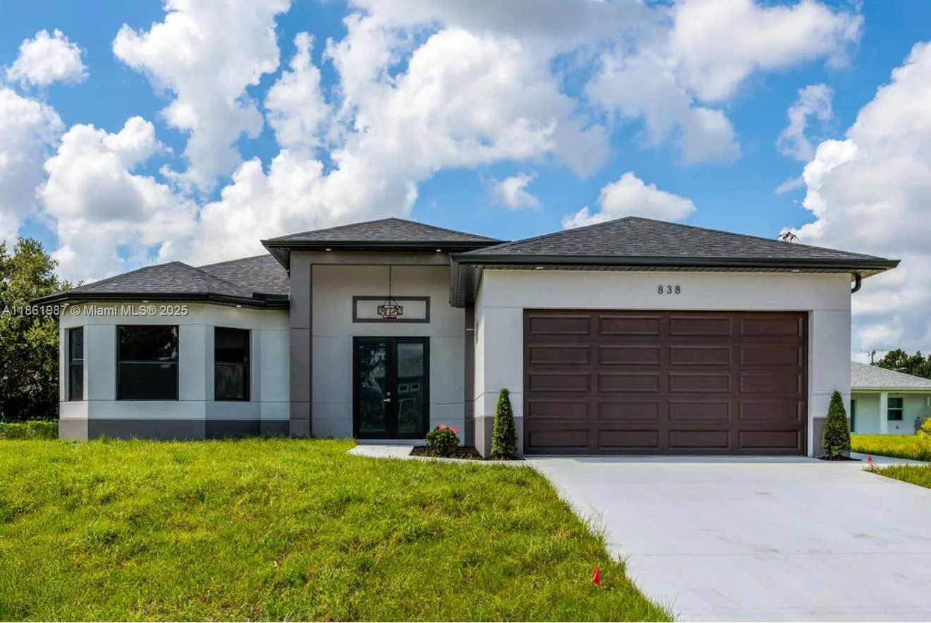 838 Chantilly St E, Lehigh Acres, FL 33974