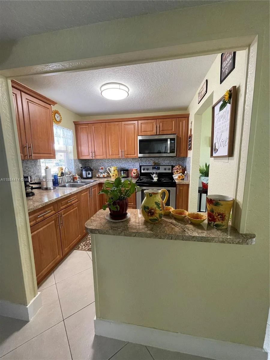 9041 Sunrise Lakes Blvd # 108, Sunrise, FL 33322 photo 10