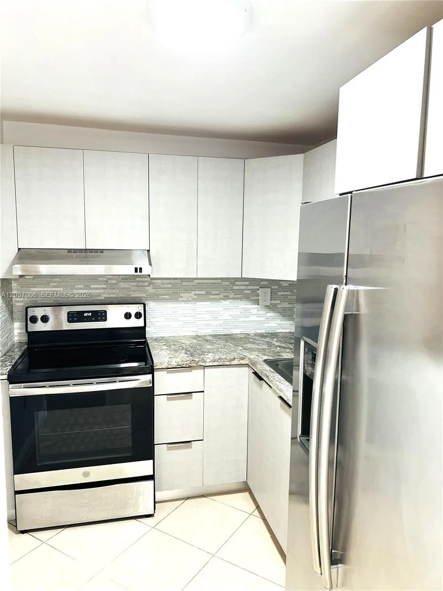 6195 W 18th Ave # G214, Hialeah, FL 33012 photo 2