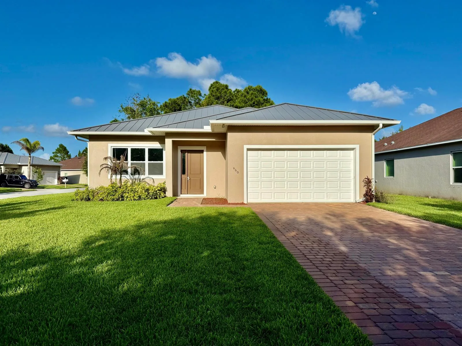 660 NE Moss Rose Place, Port St. Lucie, FL 34983