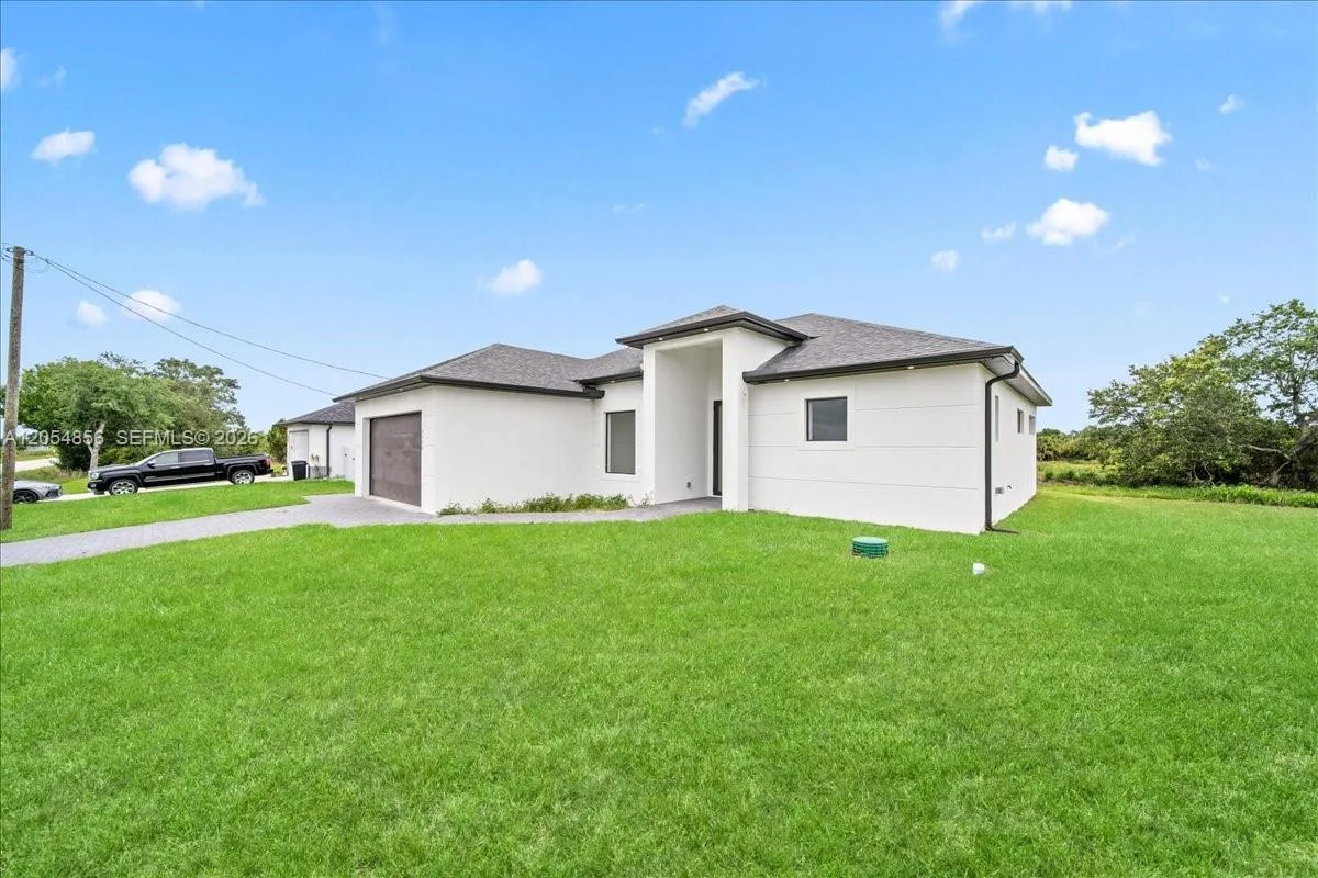3371 Meadow Rd, Lehigh Acres, FL 33974 photo 3