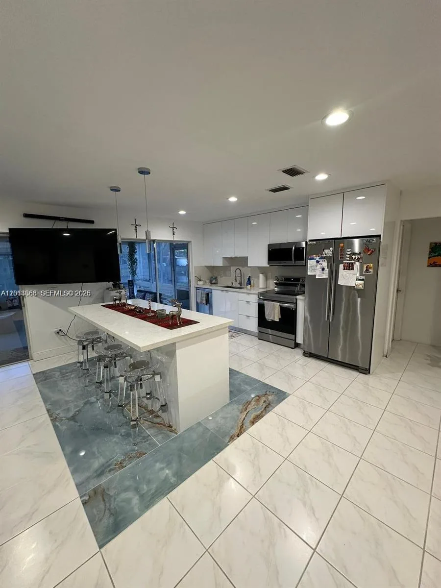 9590 NW 24th Pl, Sunrise, FL 33322 photo 4