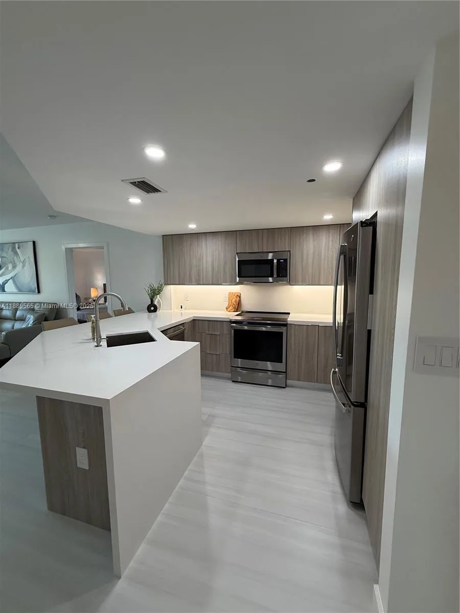 201 Golden Isles Dr # 302, Hallandale Beach, FL 33009 photo 2