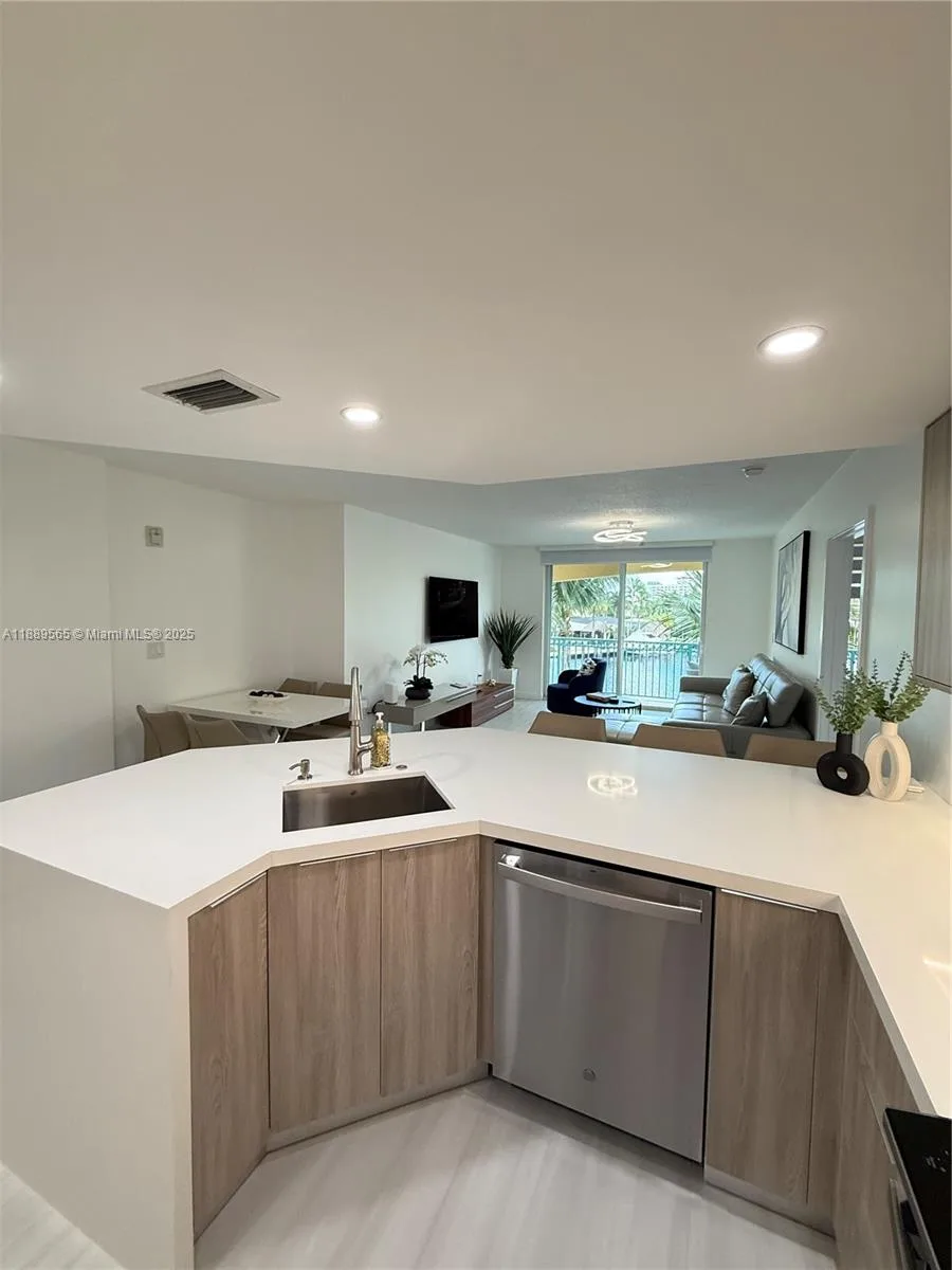 201 Golden Isles Dr # 302, Hallandale Beach, FL 33009 photo 3