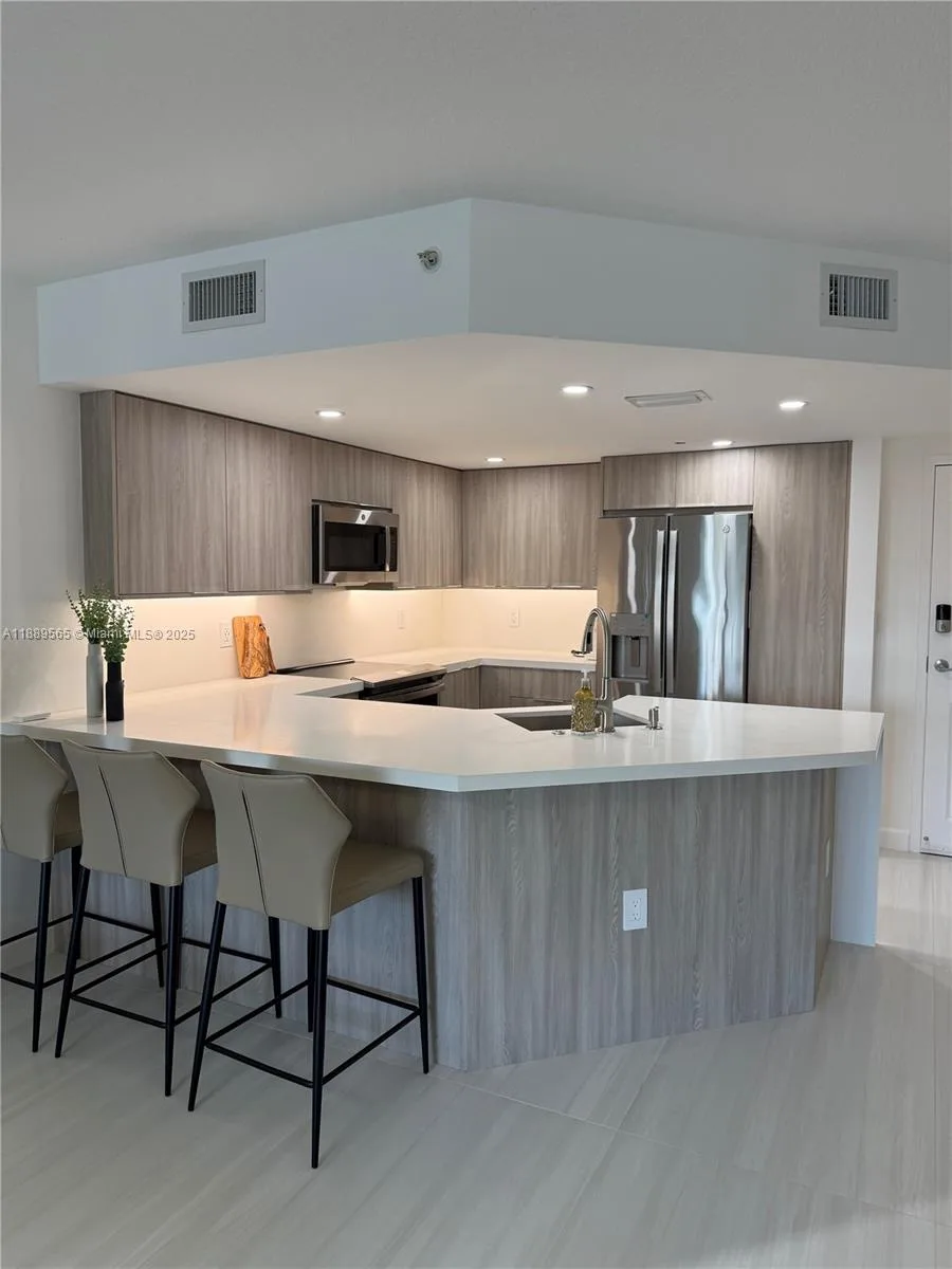 201 Golden Isles Dr # 302, Hallandale Beach, FL 33009 photo 4