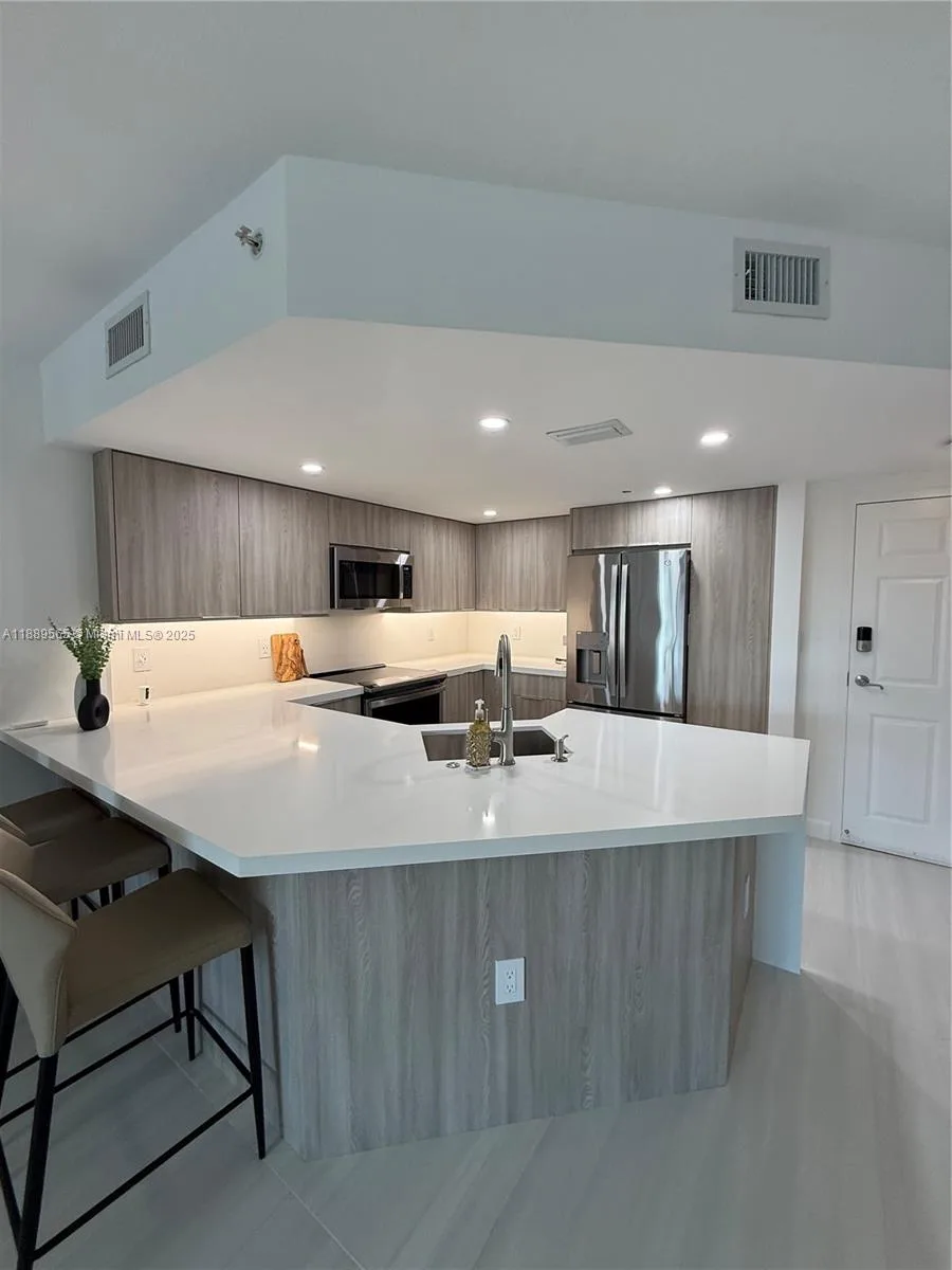 201 Golden Isles Dr # 302, Hallandale Beach, FL 33009 photo 5
