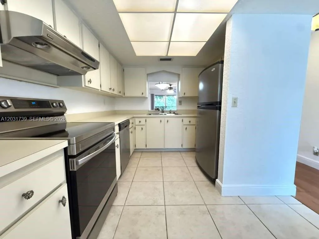 8982 W Sample Rd # 204, Coral Springs, FL 33065 photo 6