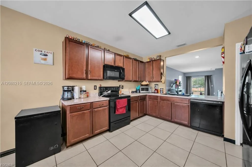 10549 Canal Brook LN, Lehigh Acres, FL 33936 photo 4