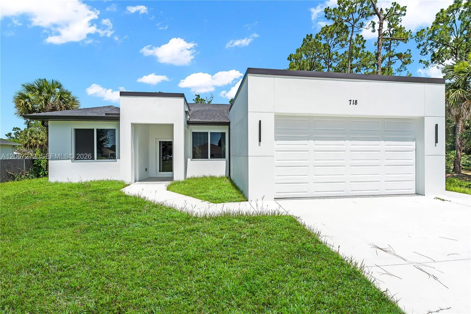 718 718 Robert AVE, Lehigh Acres, FL 33936