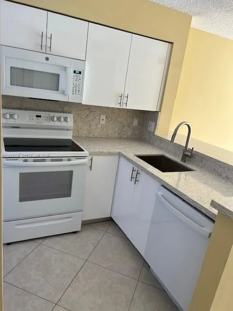 2226 N Cypress Bend Dr # 210, Pompano Beach, FL 33069 photo 9