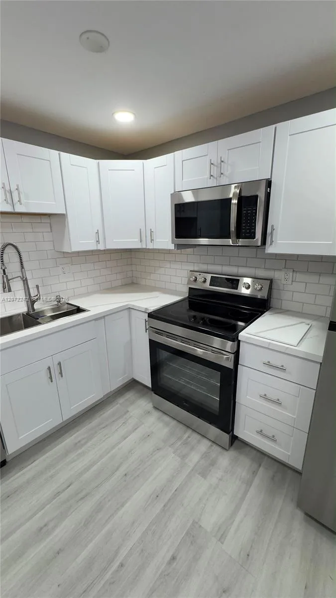 1280 NW 43rd Ave # 303, Lauderhill, FL 33313