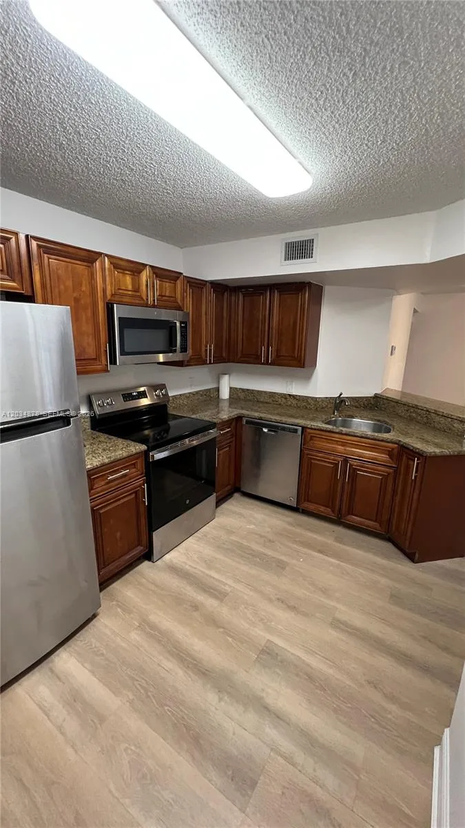 8851 Wiles Rd # 108, Coral Springs, FL 33067 photo 13