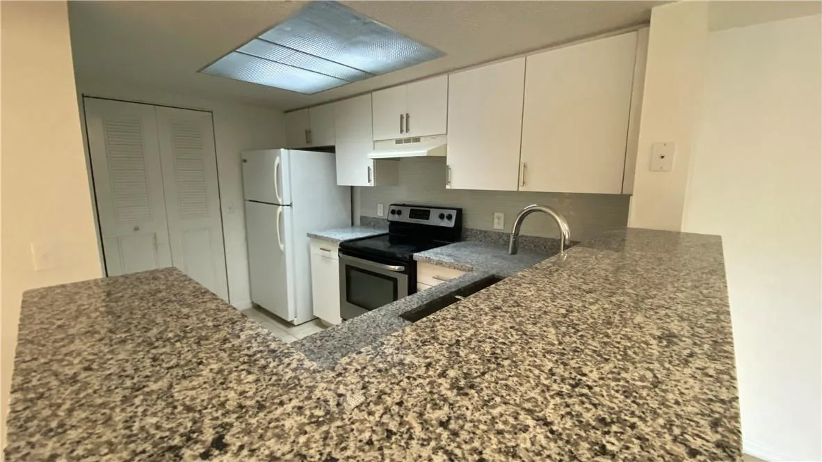 5045 WILES Road # 205, Coconut Creek, FL 33073