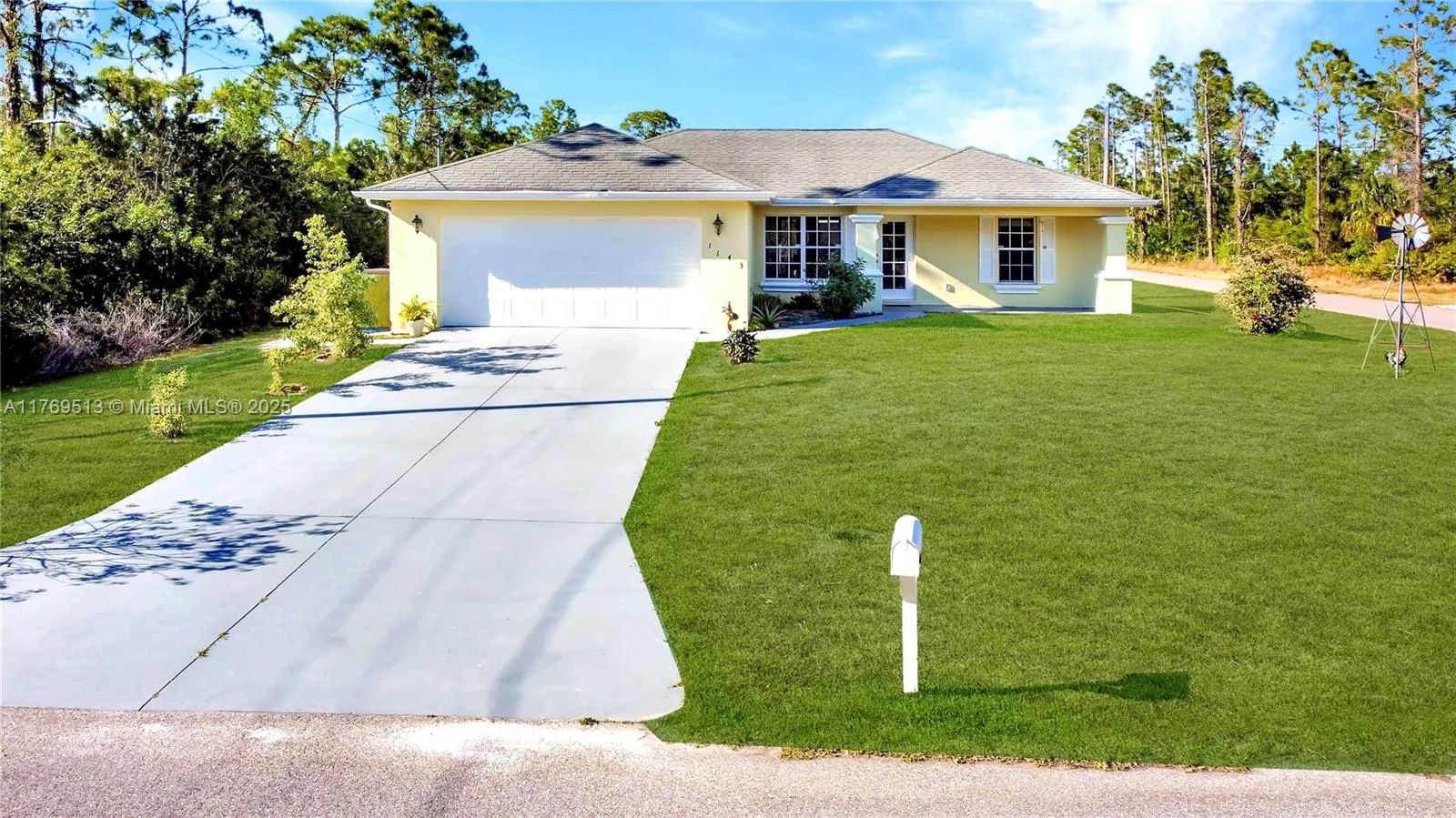 1143 COVE ST E, Lehigh Acres, FL 33974