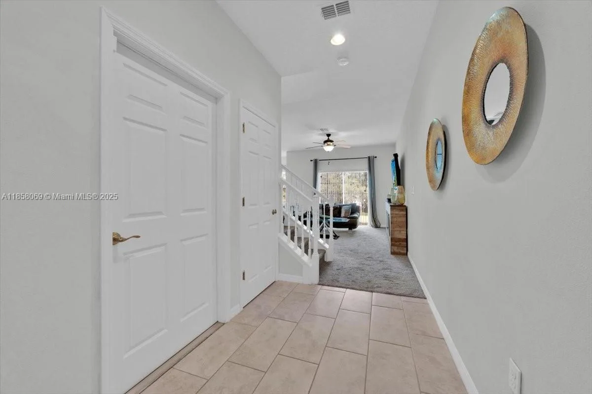 1020 LAKEFRONT VILLAGE DR, Clermont, FL 34711 photo 4