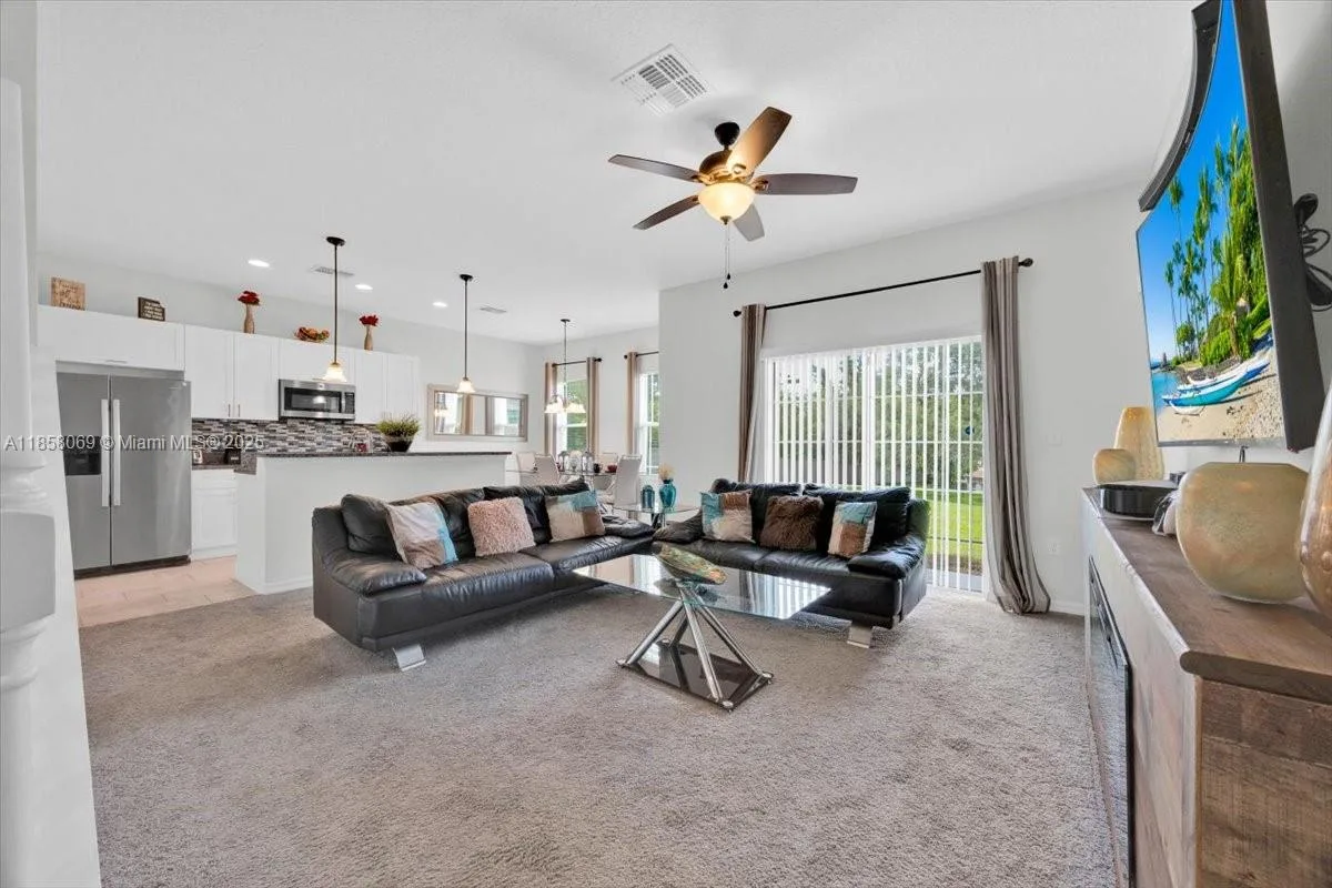 1020 LAKEFRONT VILLAGE DR, Clermont, FL 34711 photo 5