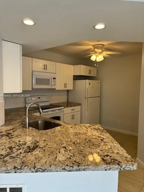 8977 Wiles Rd # 103, Coral Springs, FL 33067