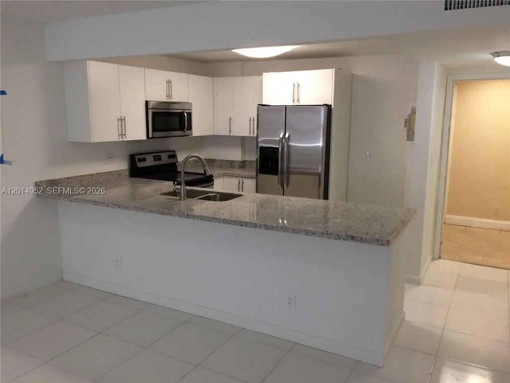 9143 SW 77 AV # B107, Miami, FL 33156 photo 2