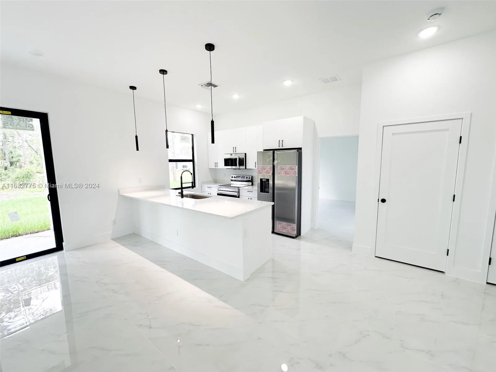 2609 34th St W, Lehigh Acres, FL 33971 photo 3