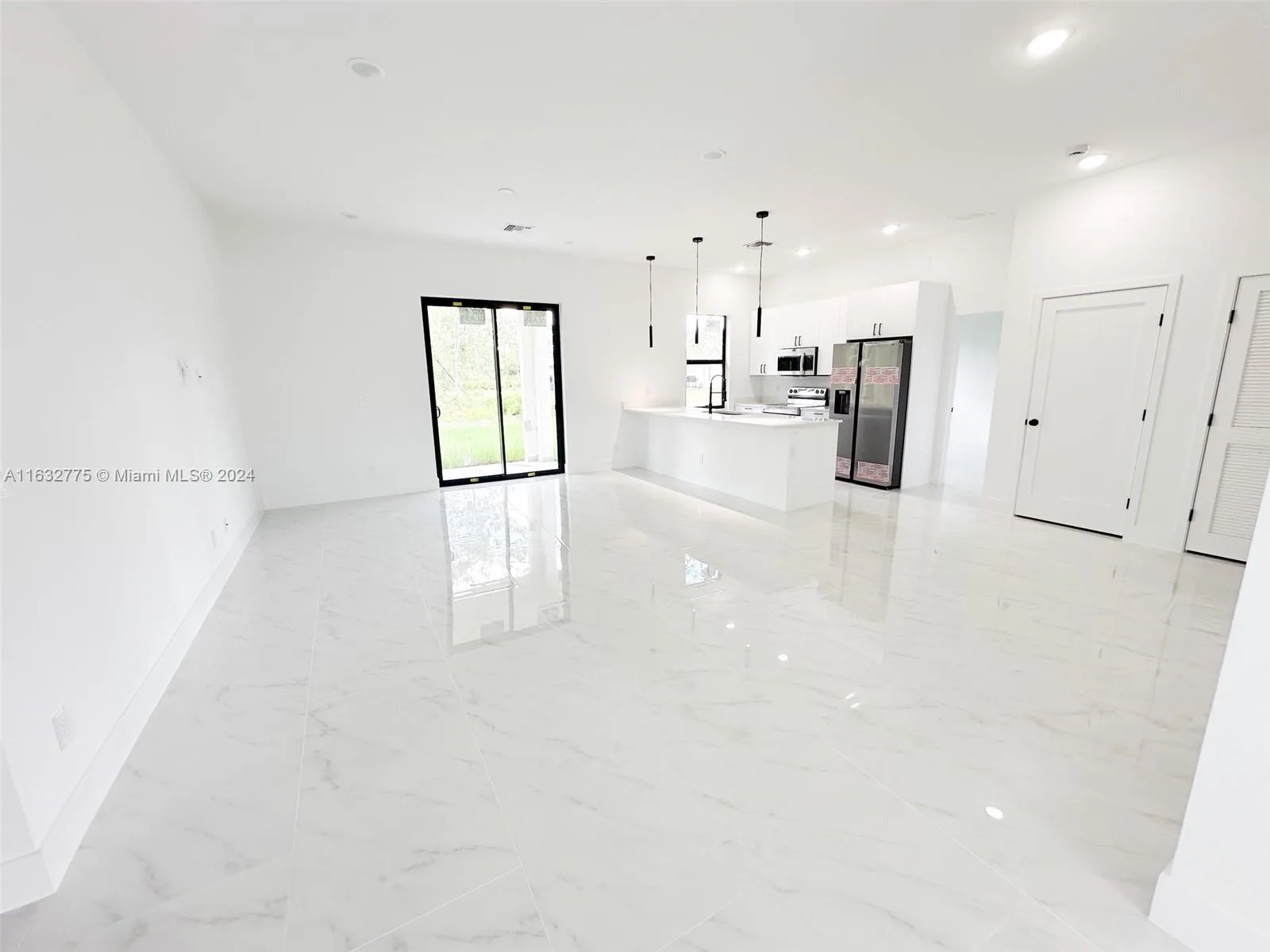 2609 34th St W, Lehigh Acres, FL 33971 photo 4