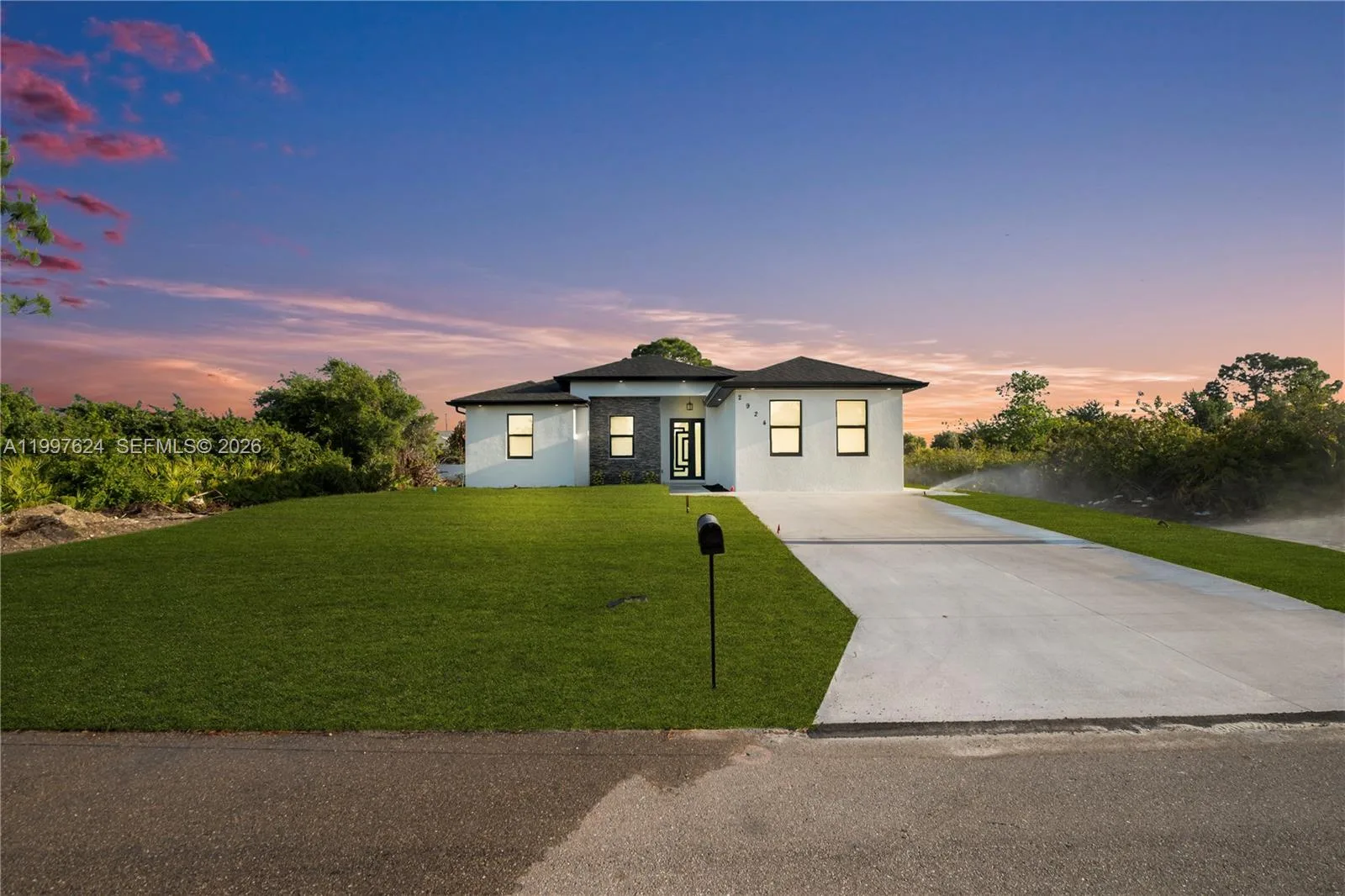 2924 5TH ST SW, Lehigh Acres, FL 33976 photo 2