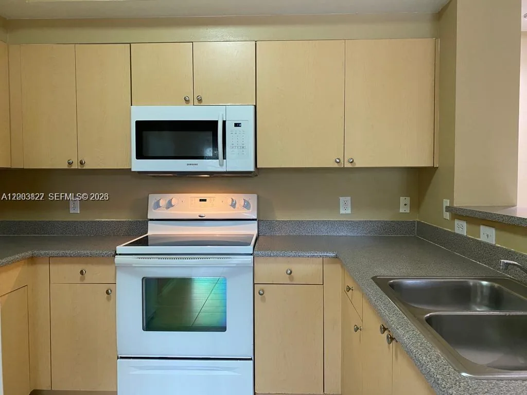 8060 N Nob Hill Rd # 203, Tamarac, FL 33321 photo 2