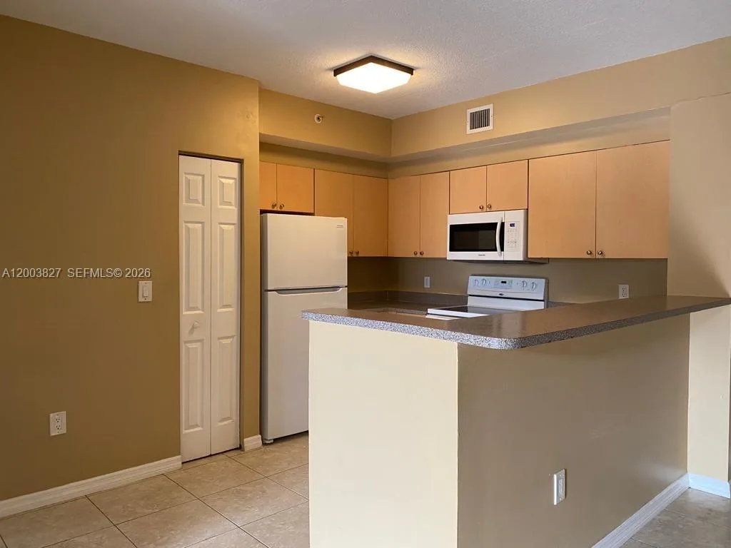 8060 N Nob Hill Rd # 203, Tamarac, FL 33321 photo 3