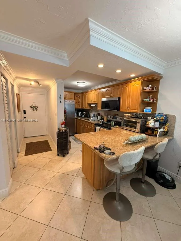 5501 NW 7th St # E207, Miami, FL 33126 photo 2