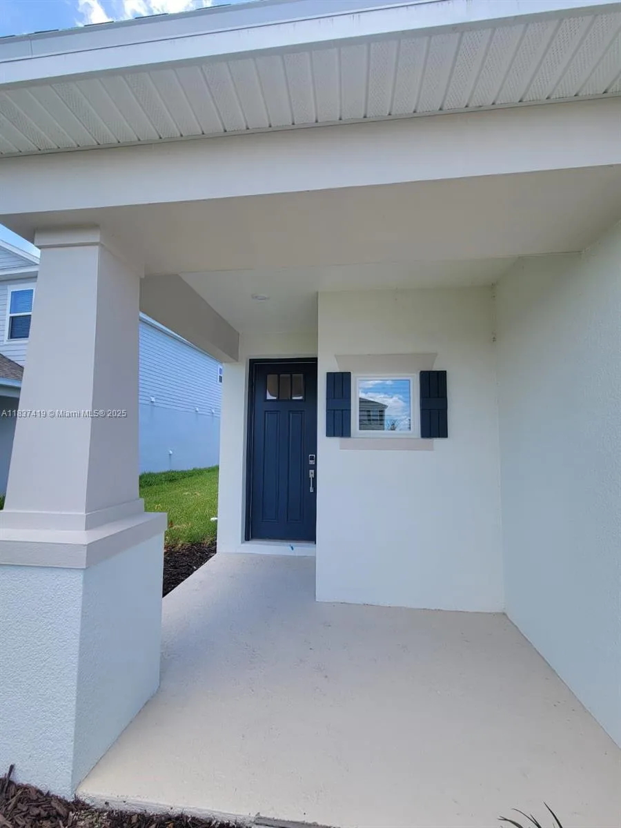 5727 GINGHAM DR, Kissimmee, FL 34758 photo 2