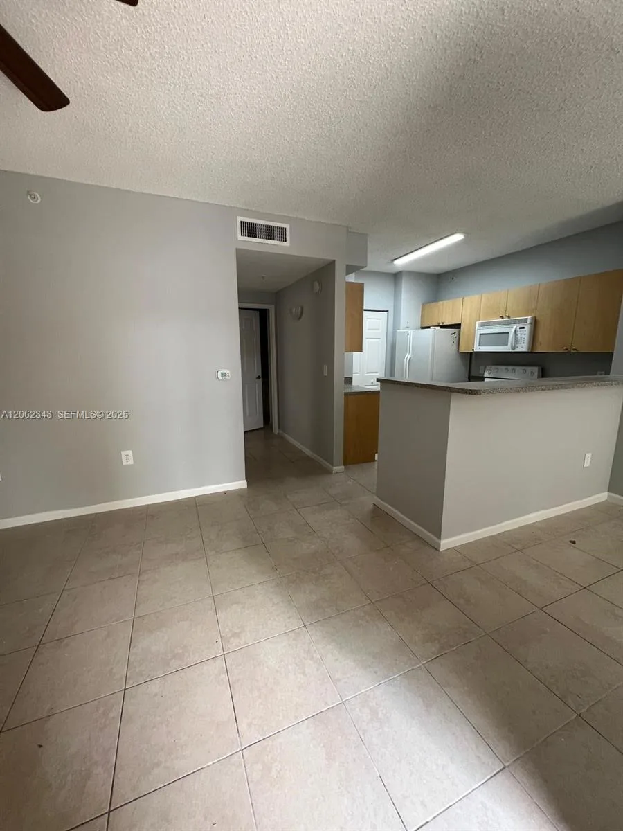 8020 N Nob Hill Rd # 102, Tamarac, FL 33321 photo 2
