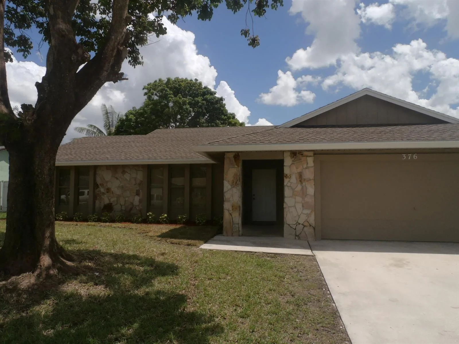 376 La Mancha Avenue, Royal Palm Beach, FL 33411