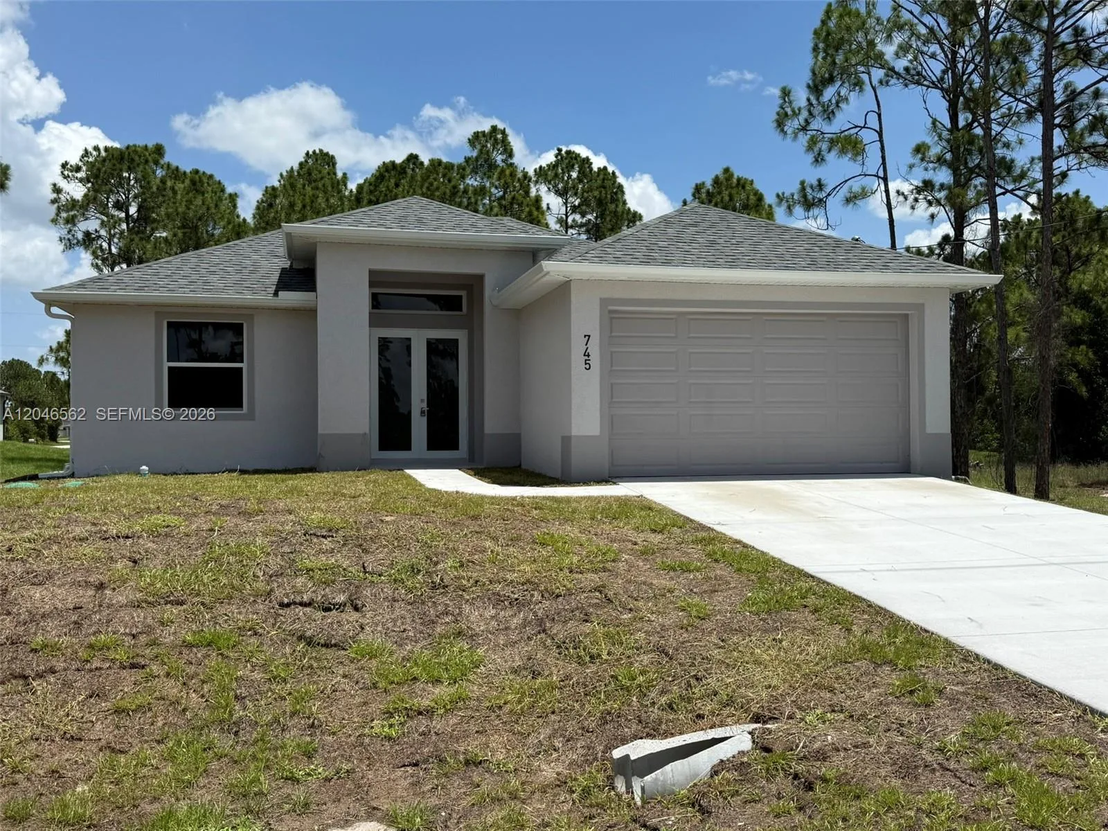 745 Manuel St E, Lehigh Acres, FL 33974