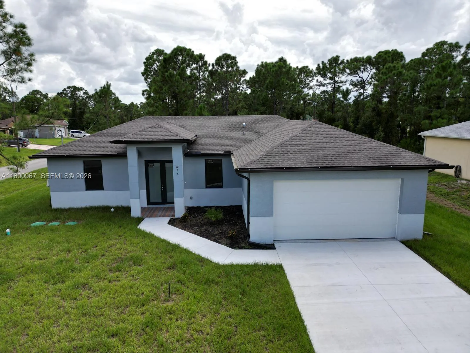 672 Nimitz BLVD, Lehigh Acres, FL 33974