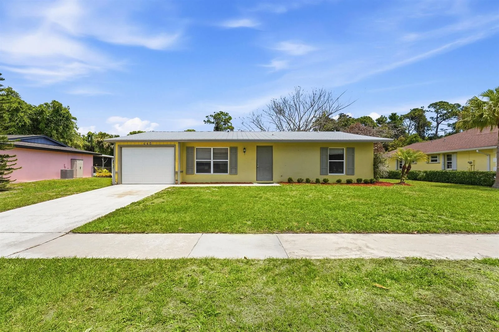 445 NE Armory Circle, Port St. Lucie, FL 34983