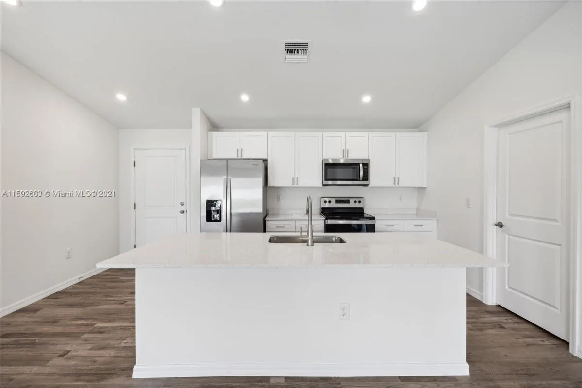 1204 NW 15th Ave, Cape Coral, FL 33993 photo 3
