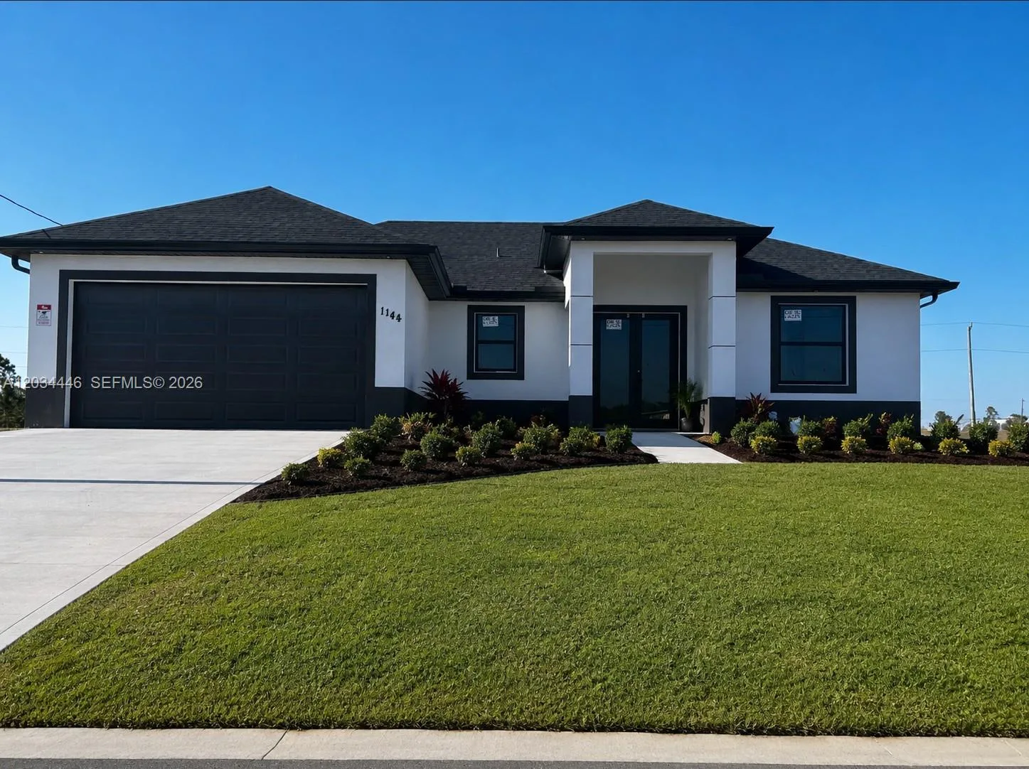 1144 Ecstasy ST E, Lehigh Acres, FL 33974