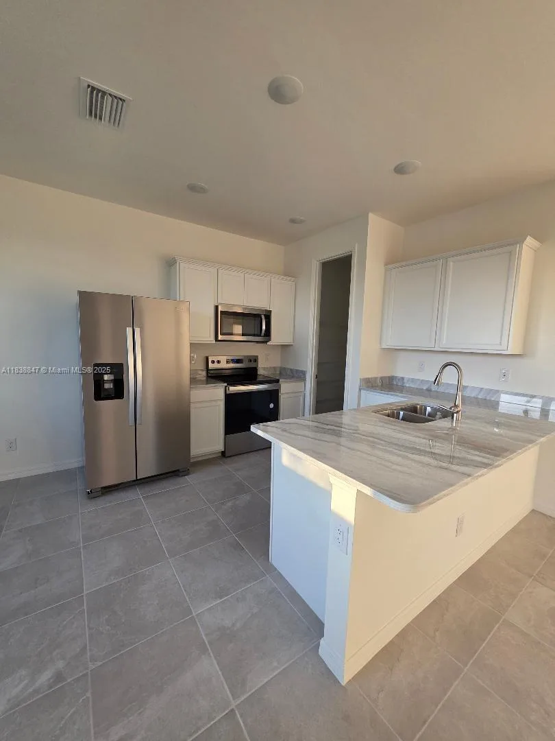 408 NW 31 St PL # 0, Cape Coral, FL 33993 photo 2