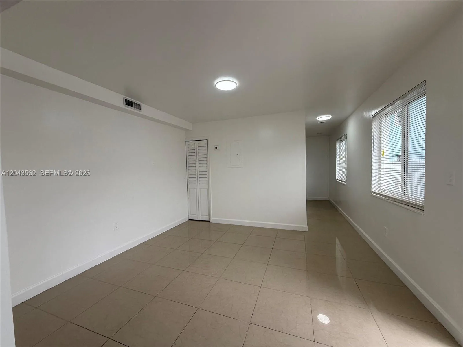 1122 NW 32nd Ct # front, Miami, FL 33125 photo 2