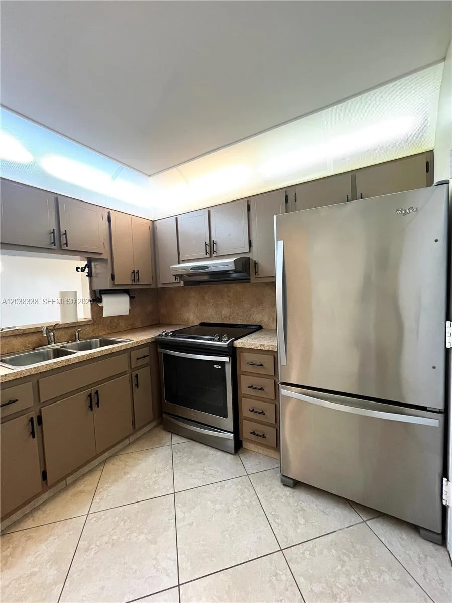 12035 NE 2nd Ave # A302, North Miami, FL 33161 photo 2
