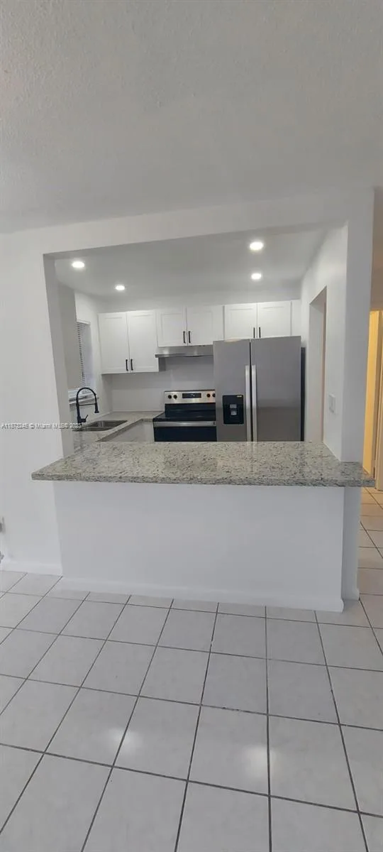 3033 NW 43rd Ave # 108, Lauderdale Lakes, FL 33313