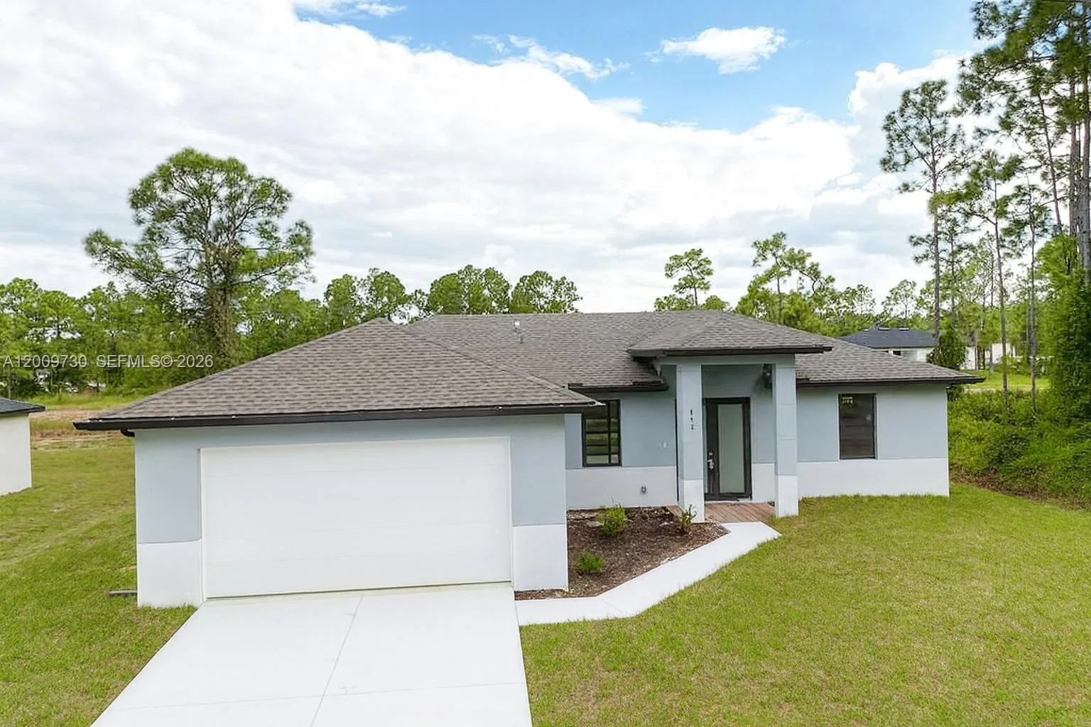 612 Ames ST E, Lehigh Acres, FL 33974