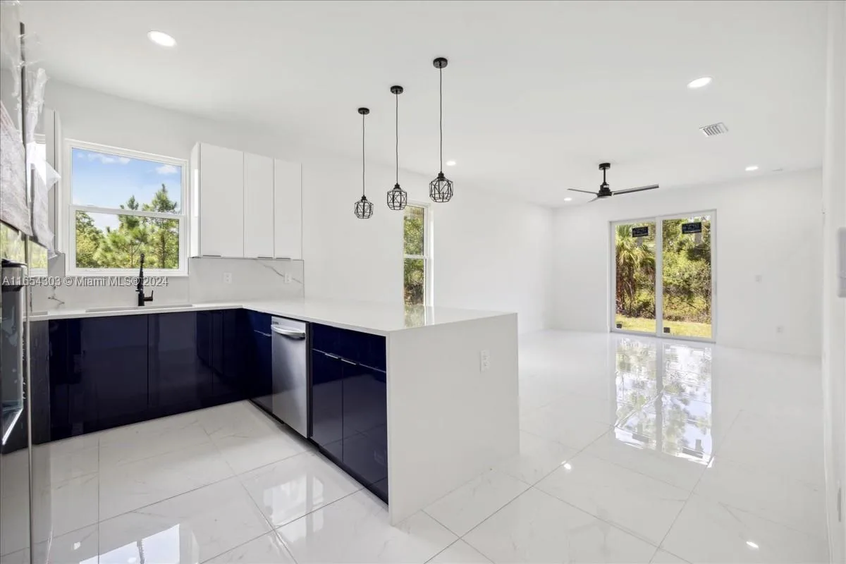 1025 Binkley St E, Lehigh Acres, FL 33974 photo 3