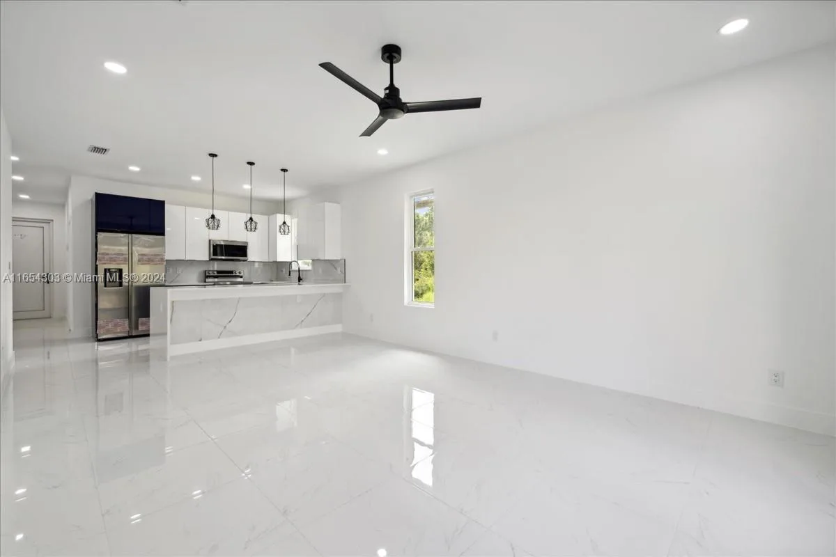 1025 Binkley St E, Lehigh Acres, FL 33974 photo 4