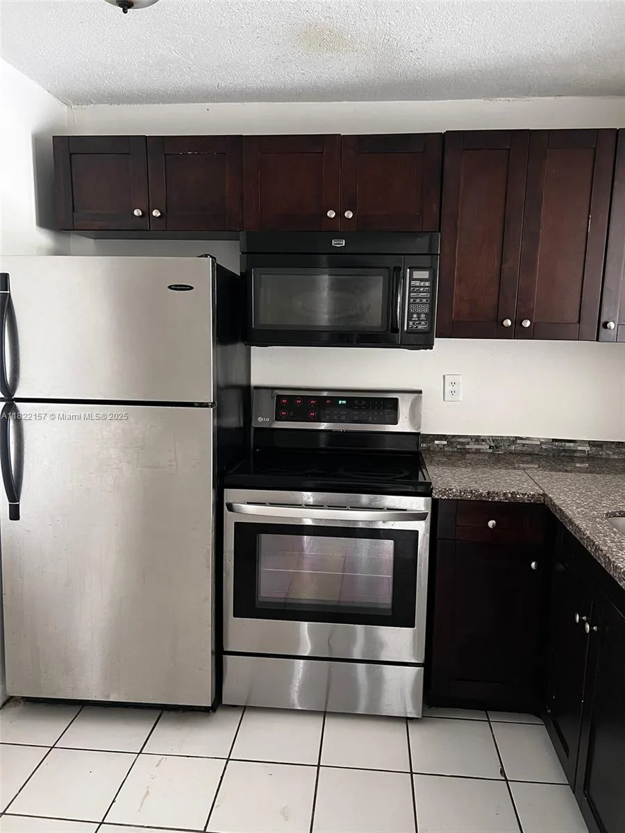 498 NW 165th St Rd # D303, Miami, FL 33169