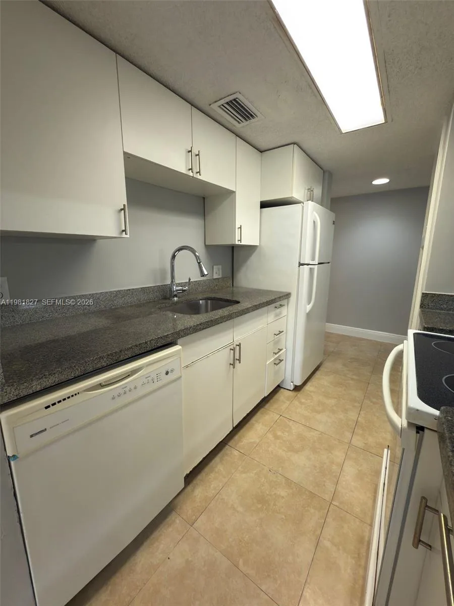 4521 W Mcnab Rd # 11, Pompano Beach, FL 33069 photo 2