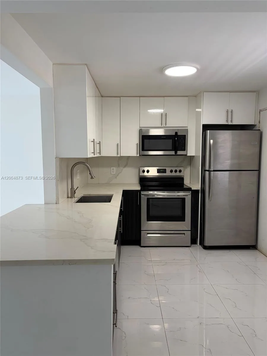 1401 NE 191st St # D201, Miami, FL 33179 photo 2
