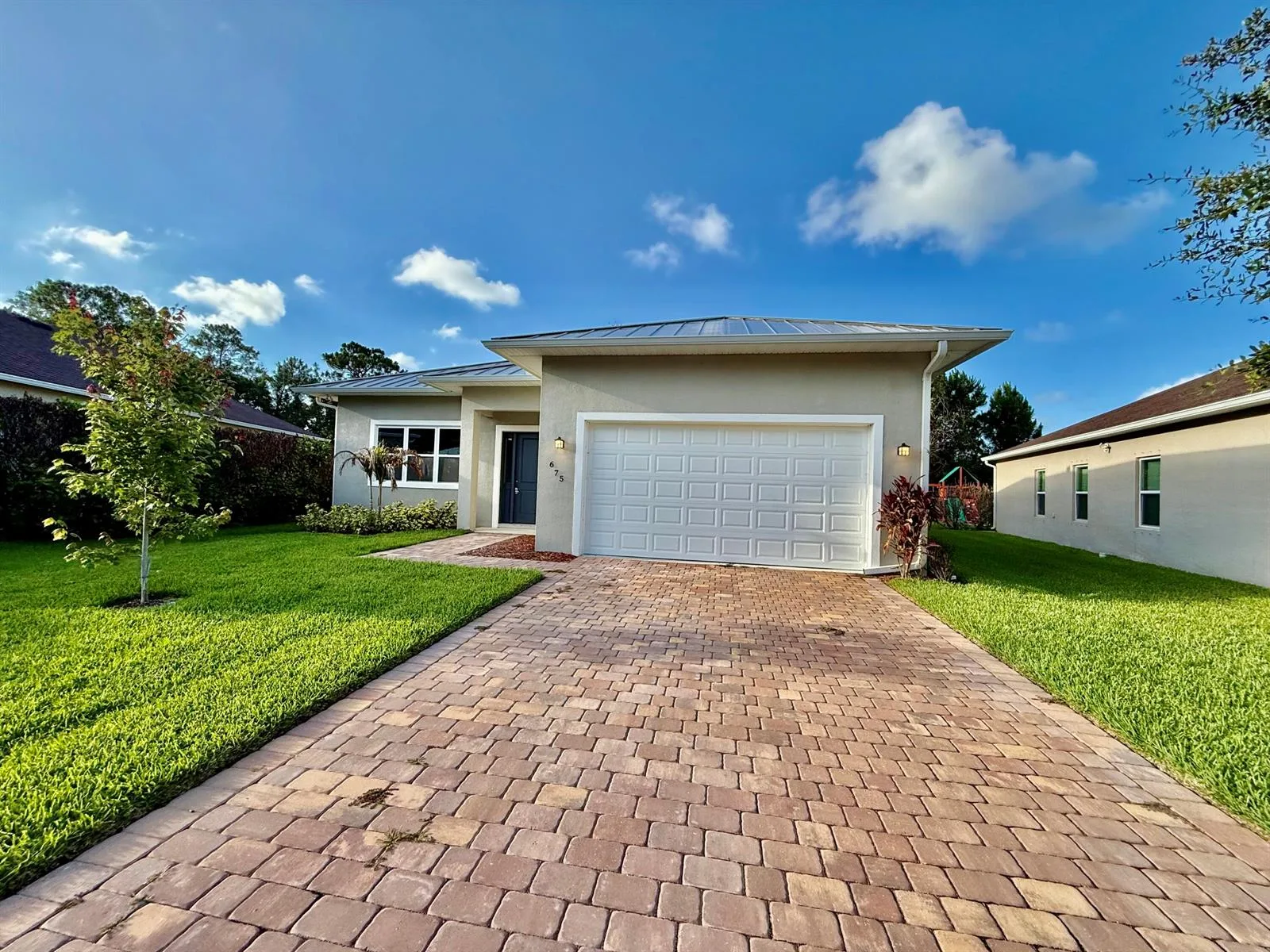 675 NE Moss Rose Place, Port St. Lucie, FL 34983 photo 2