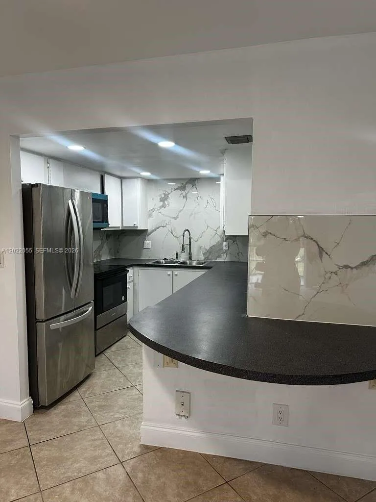 6301 N Falls Cir Dr # 309, Lauderhill, FL 33319 photo 10