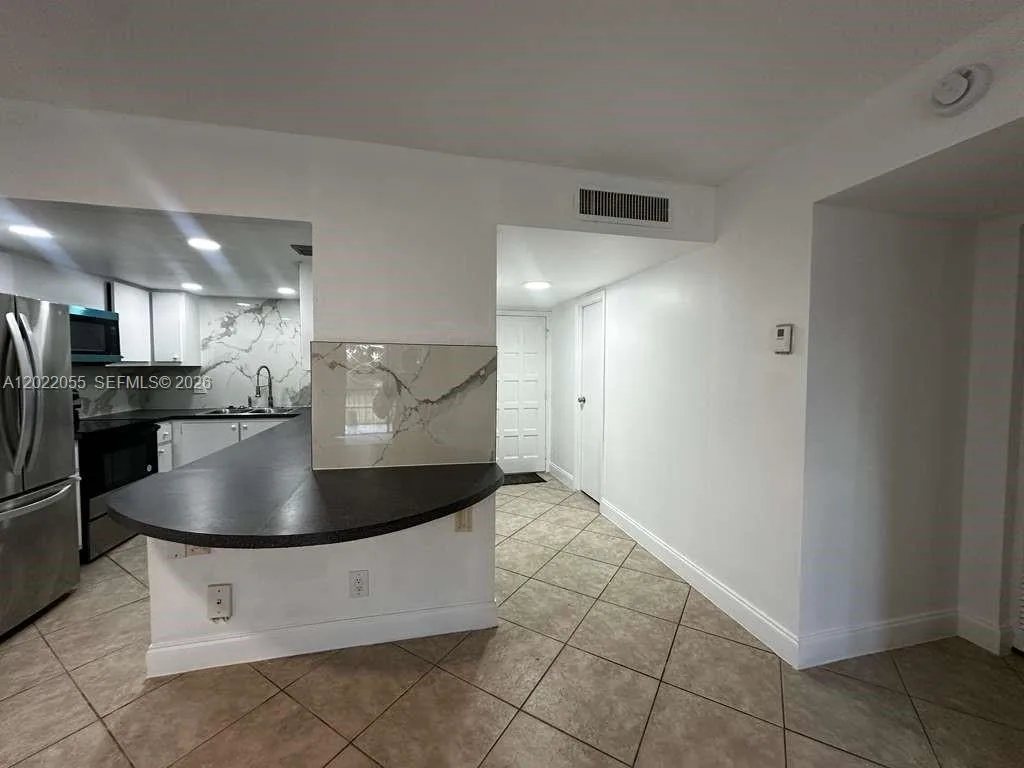 6301 N Falls Cir Dr # 309, Lauderhill, FL 33319 photo 11