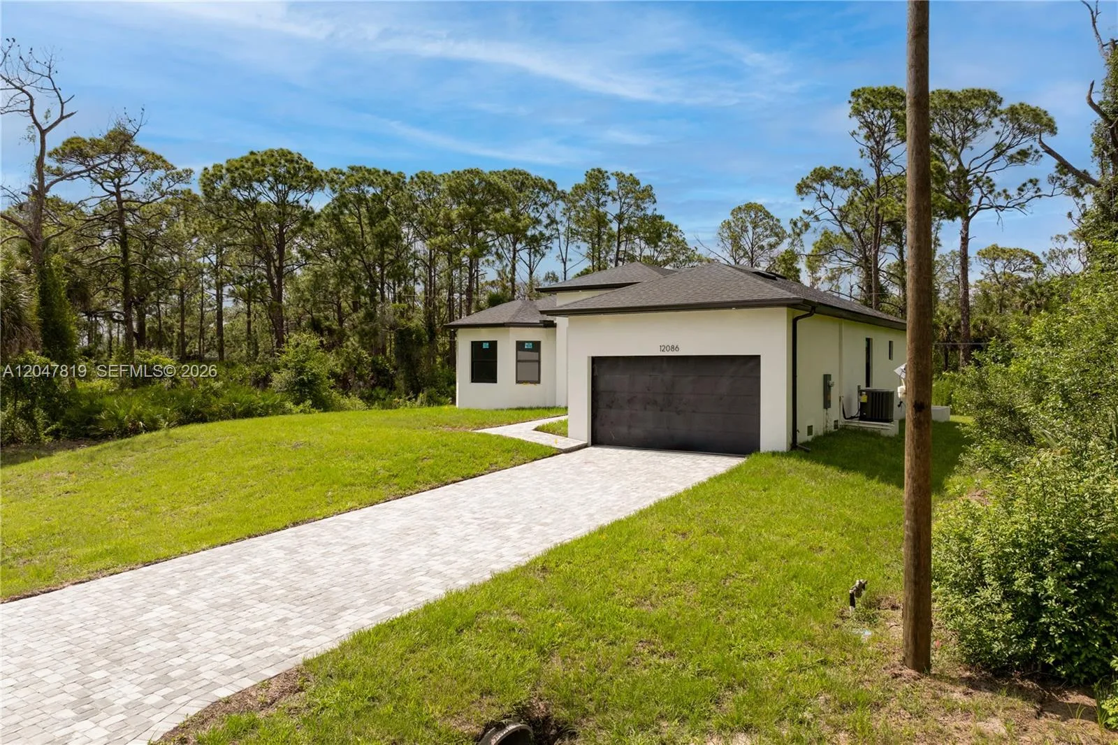 12086 Chamberlain Blvd, Port Charlotte, FL 33953 photo 2